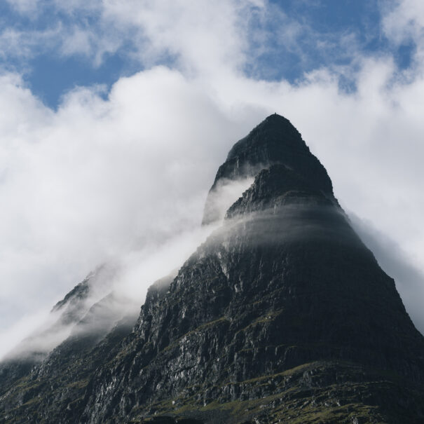 Summit of Mount Innerdalstarnet in the valley of Innerdalen. Tourist attraction of Norway. Scandinavian mountains